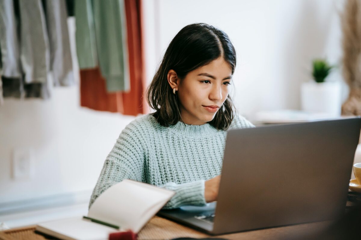 Woman sitting at a computer